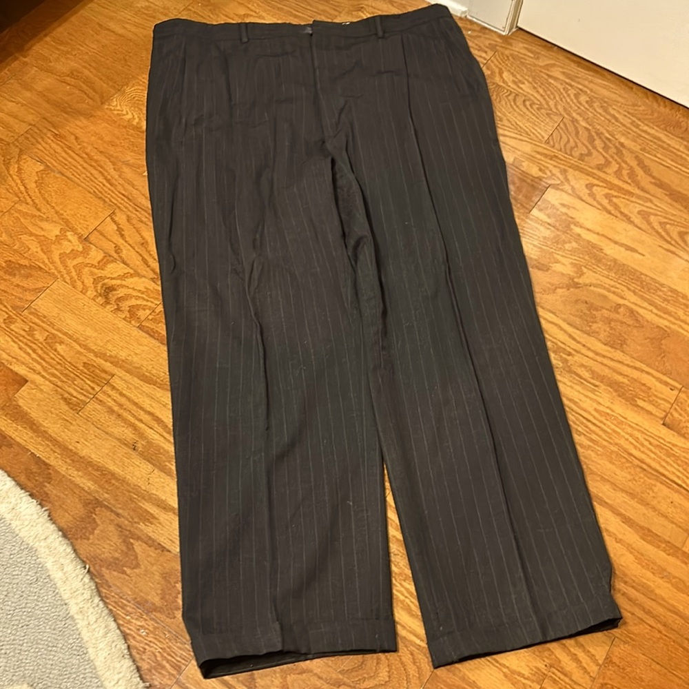 Charcoal with white pinstripes bleated men’s pants for suspenders.